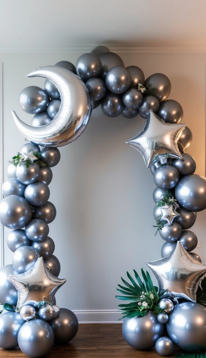 Celestial-themed silver balloon arch featuring moon and star foil accents with soft botanical touches.