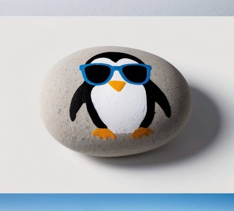 Penguins standing on snow, some wearing blue sunglasses; painted rock features a penguin with blue sunglasses; snowy and icy background.