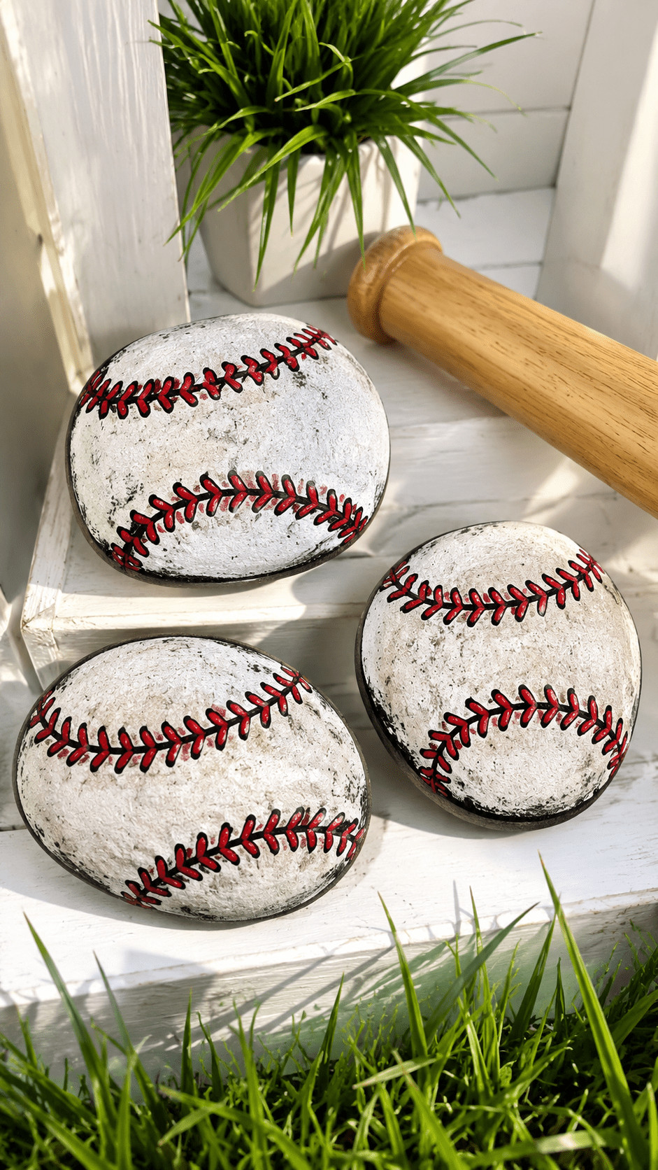 A painted baseball rock featuring bold jersey colors and a large team number design.