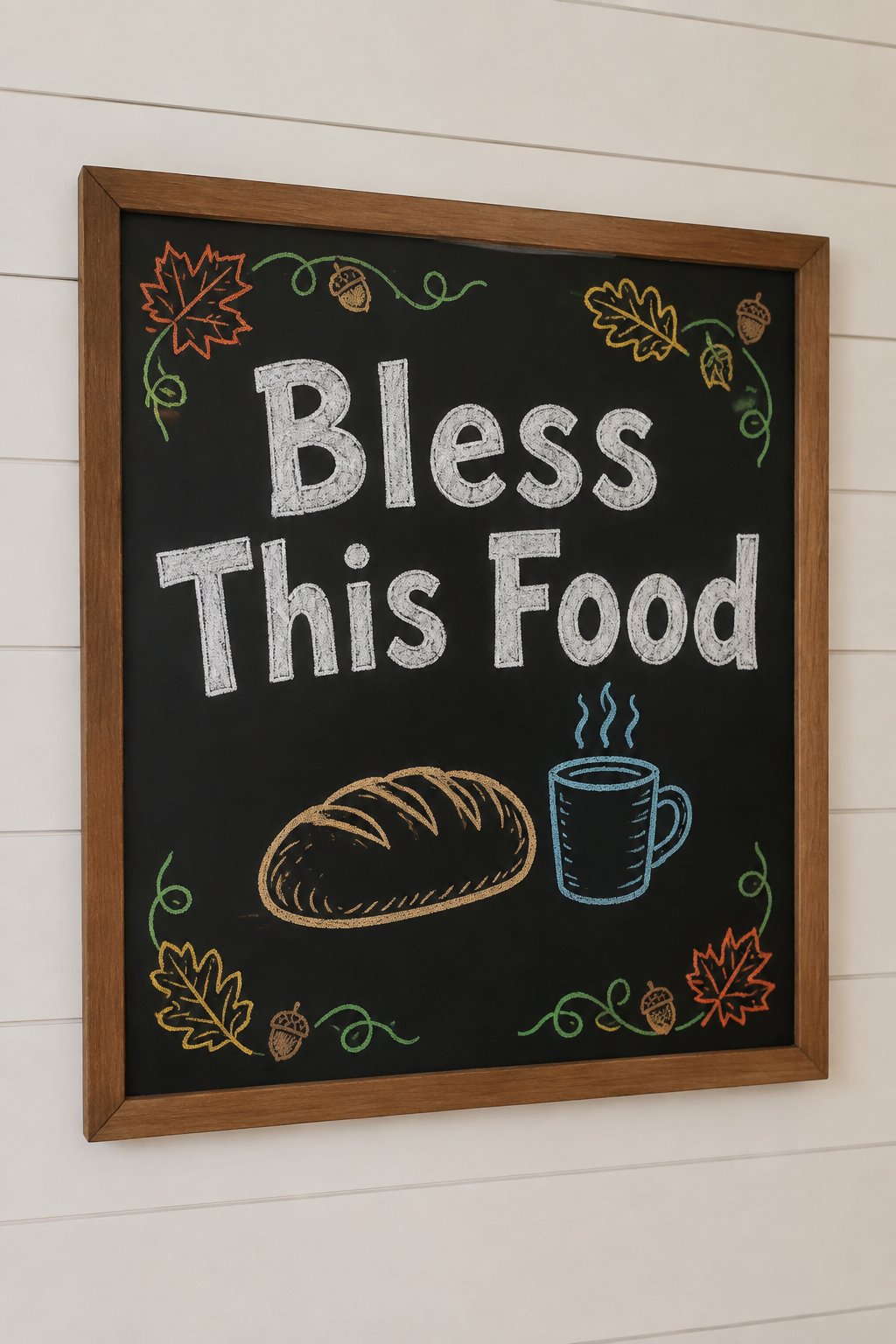 Bless This Food: a framed Thanksgiving chalkboard sign reading "Bless This Food", hand-drawn in chalk with a loaf of bread beside a cup.